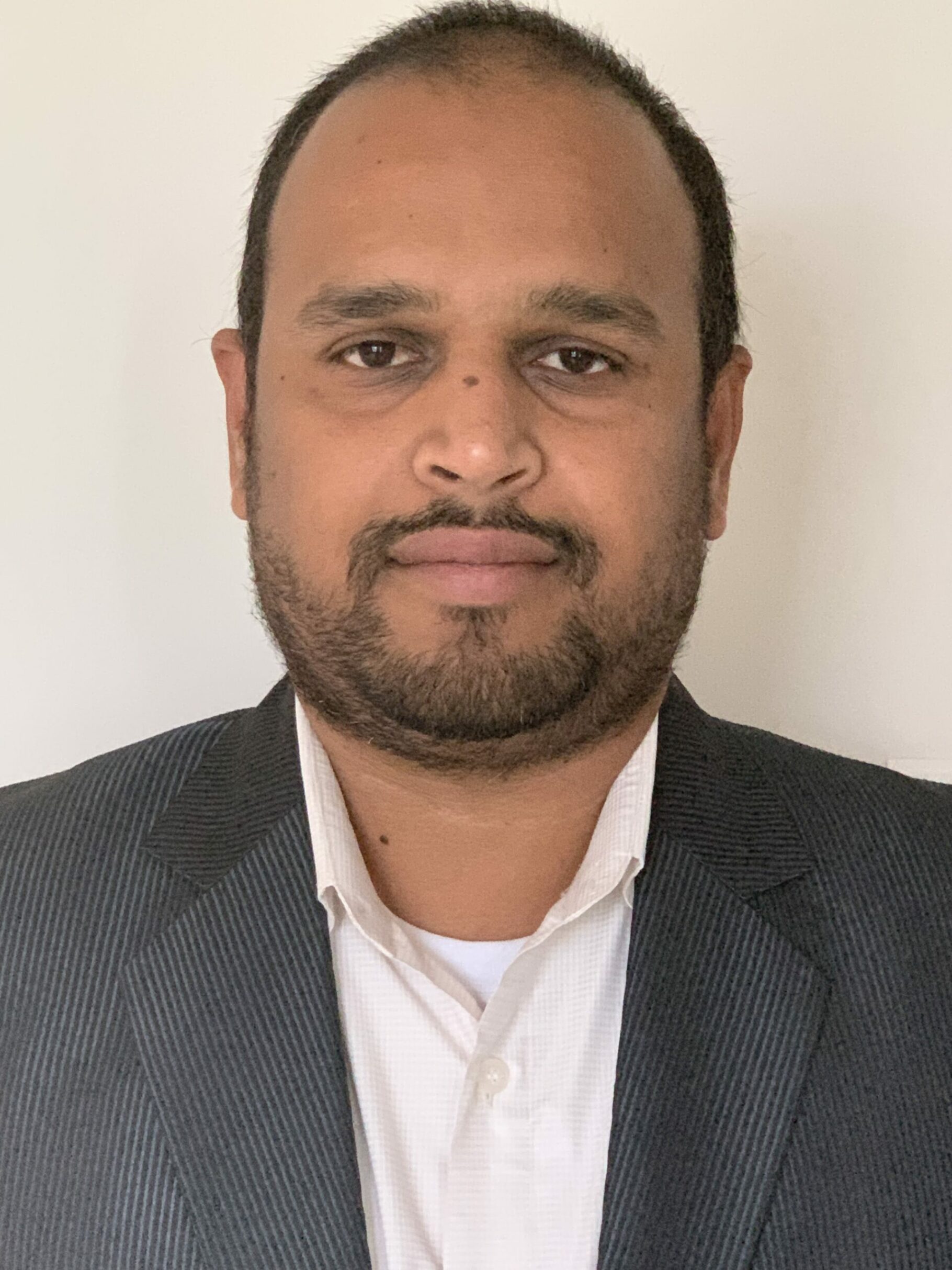 NAVEEN KARAKAVALASA